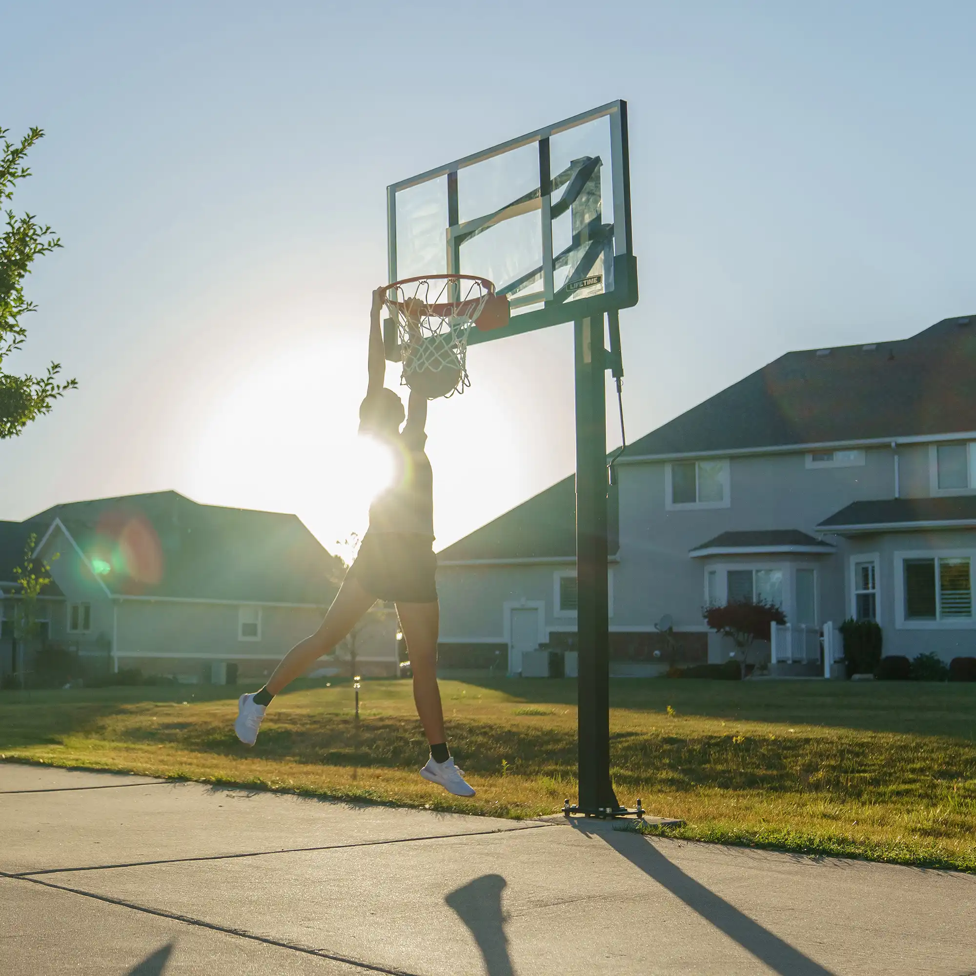 Lifetime Crank Adjust Bolt Down Basketball Hoop (54-Inch Tempered Glass) - Image 10